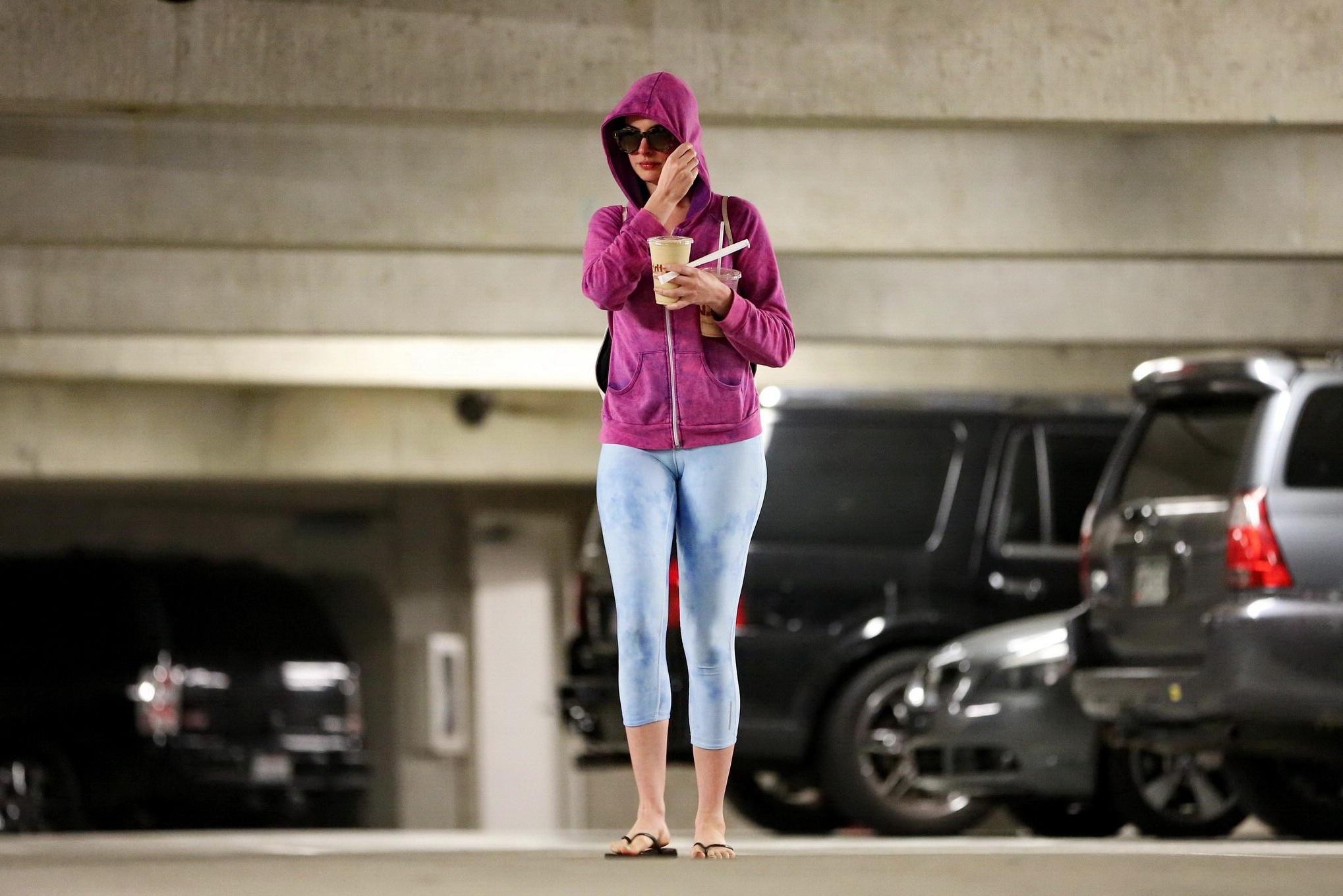 16P Anne Hathaway showing off her ass and cameltoe in sky blue tights