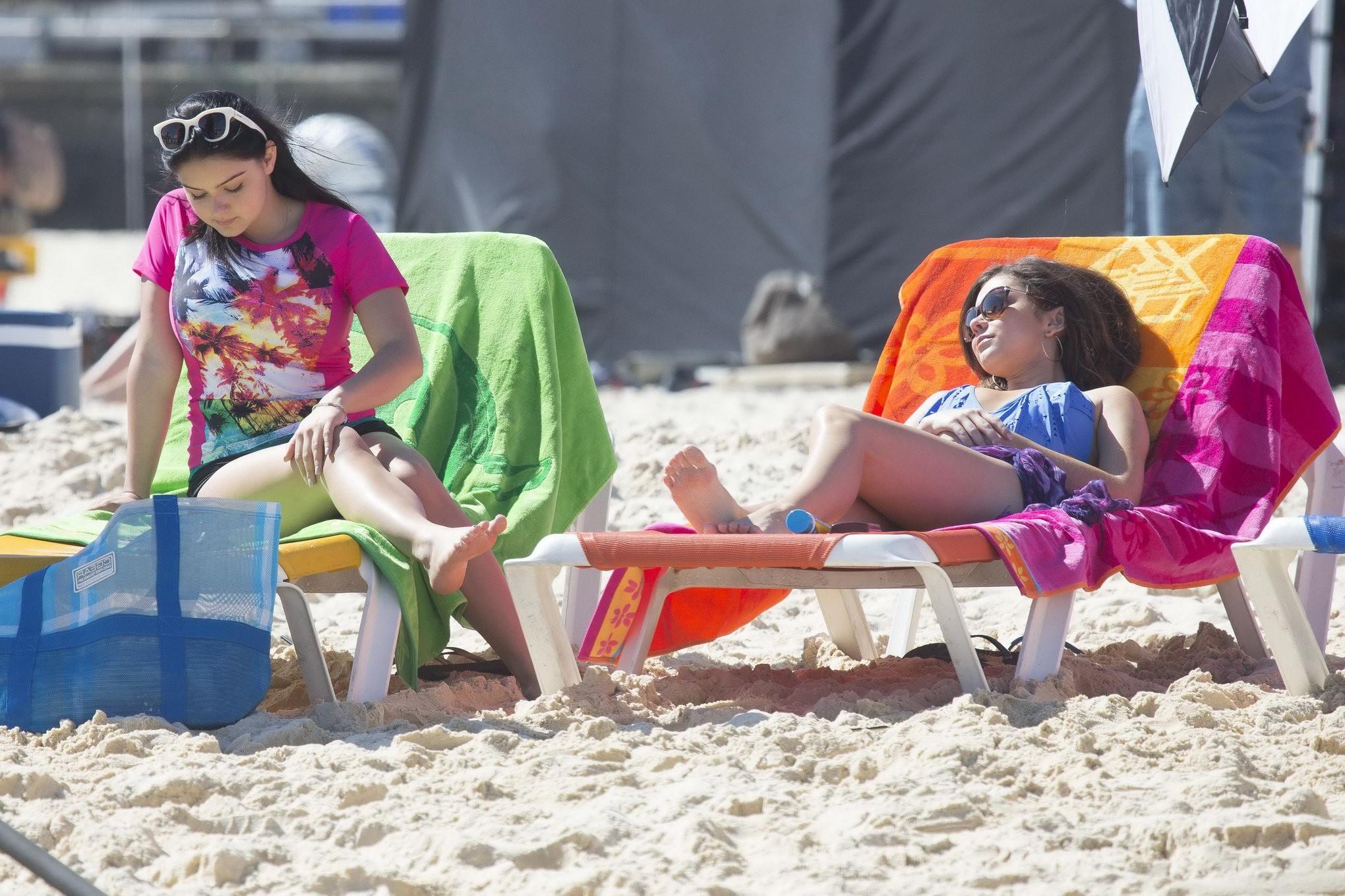 16P Sarah Hyland busty wearing skimpy blue monokini while filming Modern Family on B