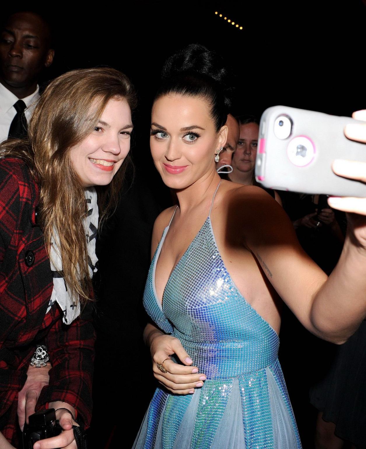 16P Katy Perry braless wearing low cut bareback blue dress at Universal Music Group 