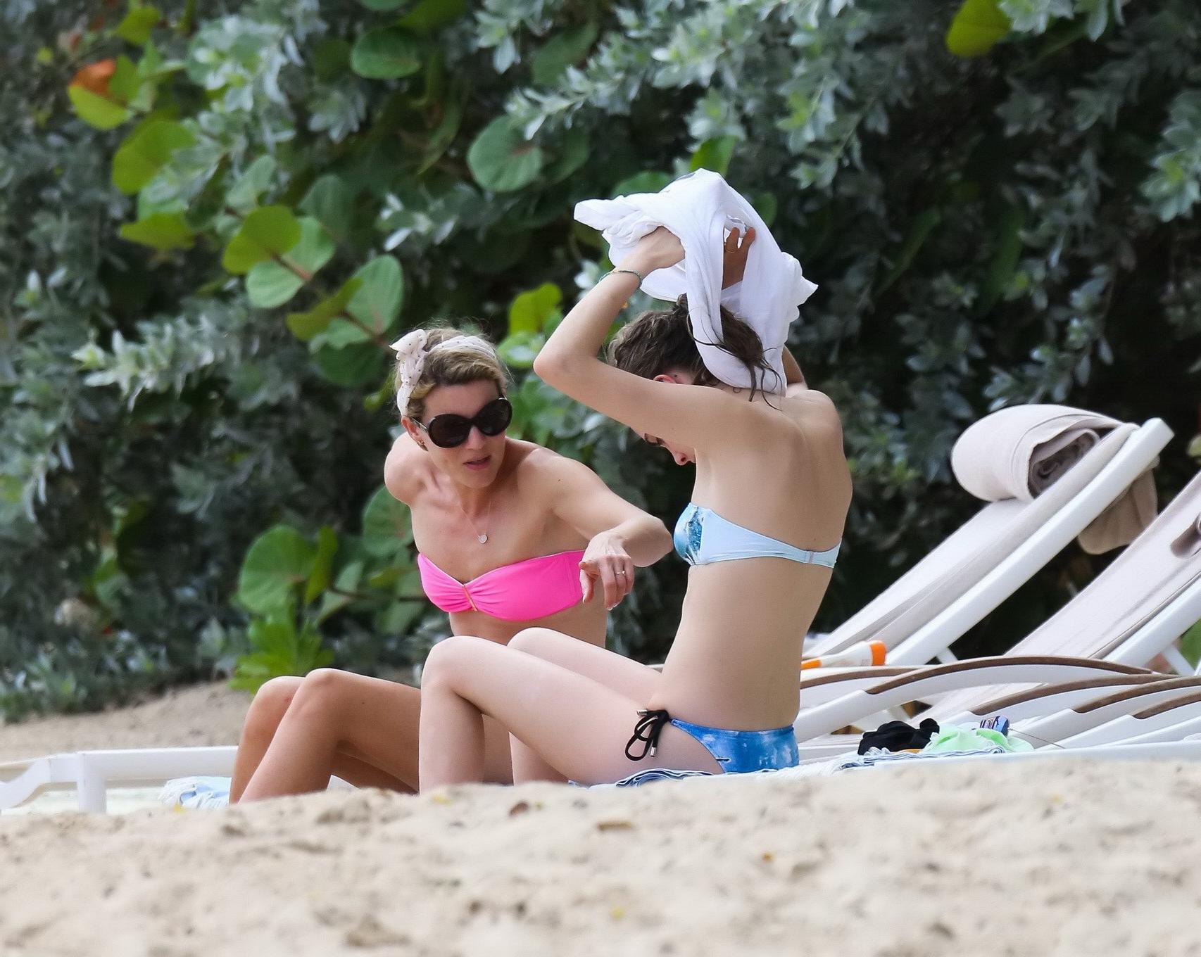 16P Cara Delevigne wearing tiny blue tube bikini at the beach in Barbados
