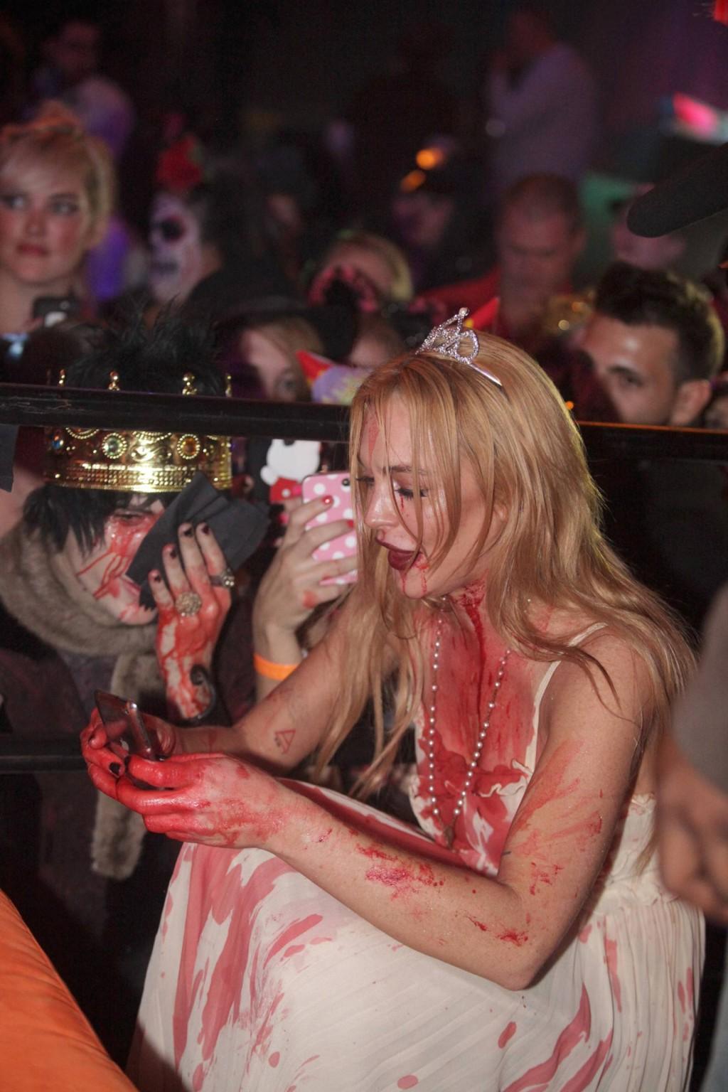 16P Lindsay Lohan in Carrie costume hosting a Halloween party at Foxwoods Resort Cas