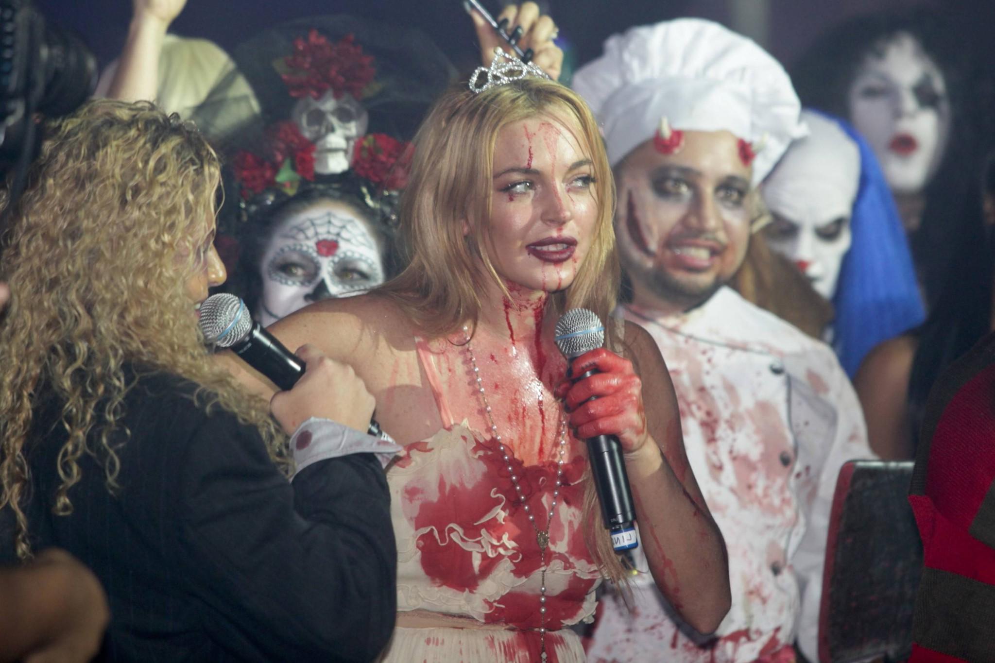 16P Lindsay Lohan in Carrie costume hosting a Halloween party at Foxwoods Resort Cas