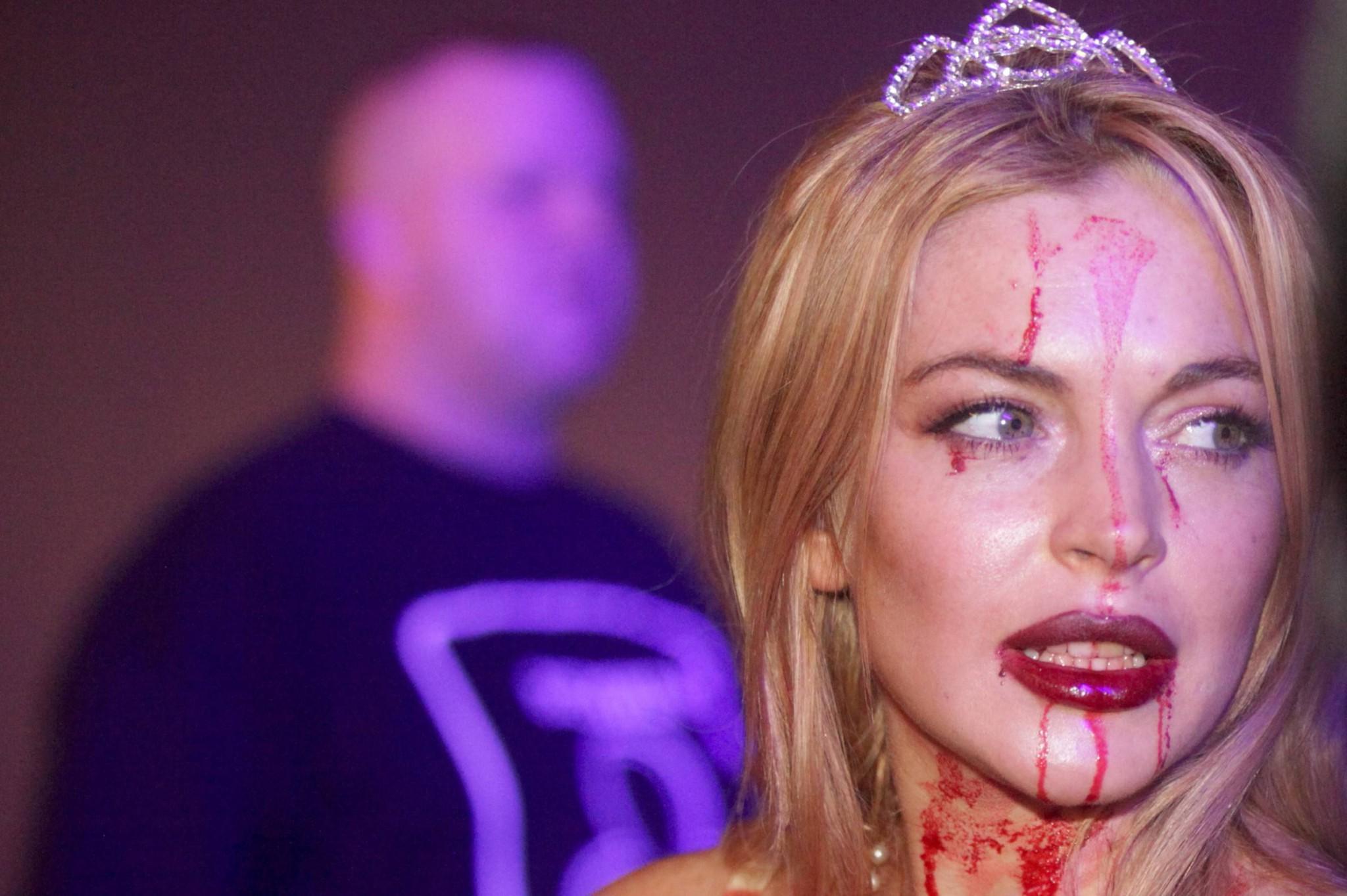 16P Lindsay Lohan in Carrie costume hosting a Halloween party at Foxwoods Resort Cas