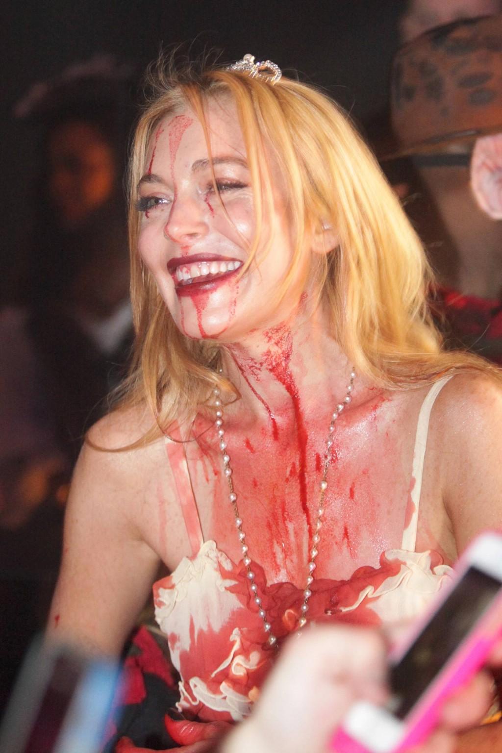 16P Lindsay Lohan in Carrie costume hosting a Halloween party at Foxwoods Resort Cas