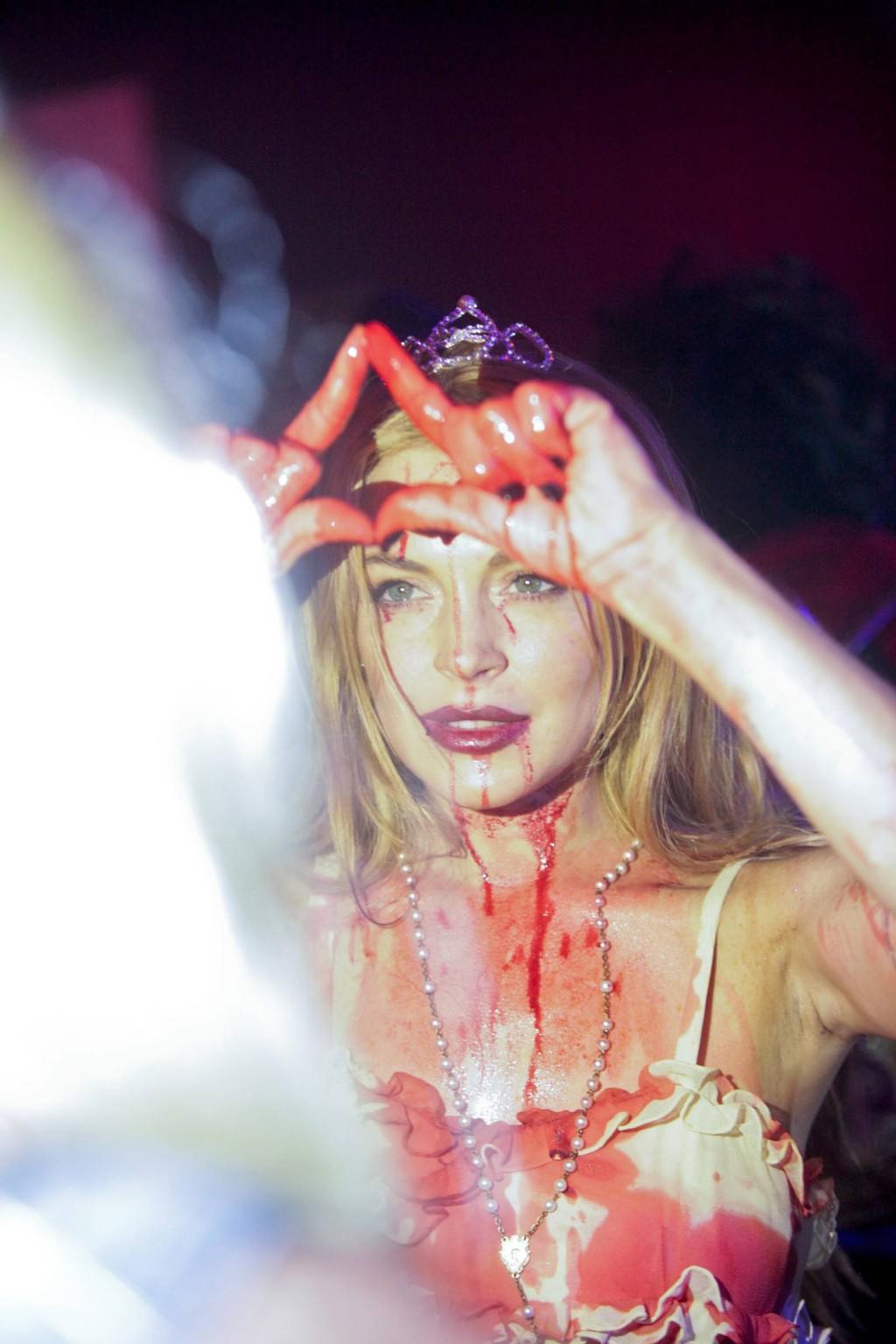 16P Lindsay Lohan in Carrie costume hosting a Halloween party at Foxwoods Resort Cas