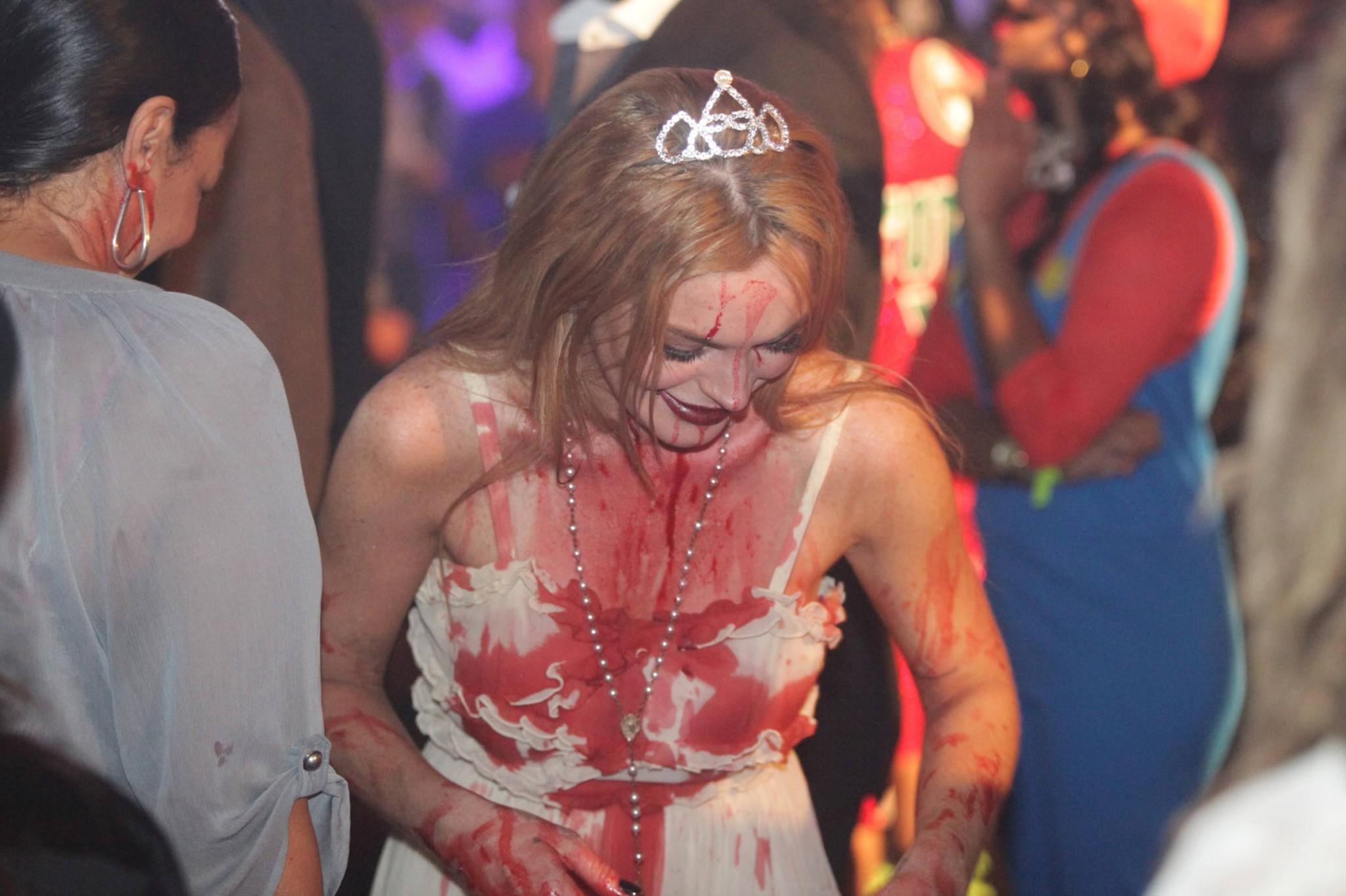 16P Lindsay Lohan in Carrie costume hosting a Halloween party at Foxwoods Resort Cas