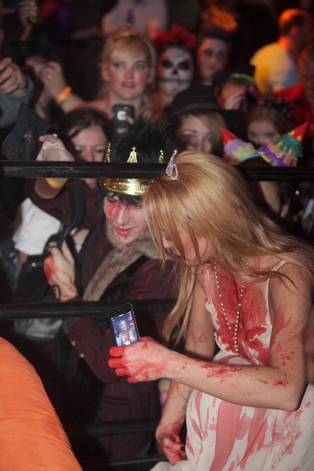 16P Lindsay Lohan in Carrie costume hosting a Halloween party at Foxwoods Resort Cas