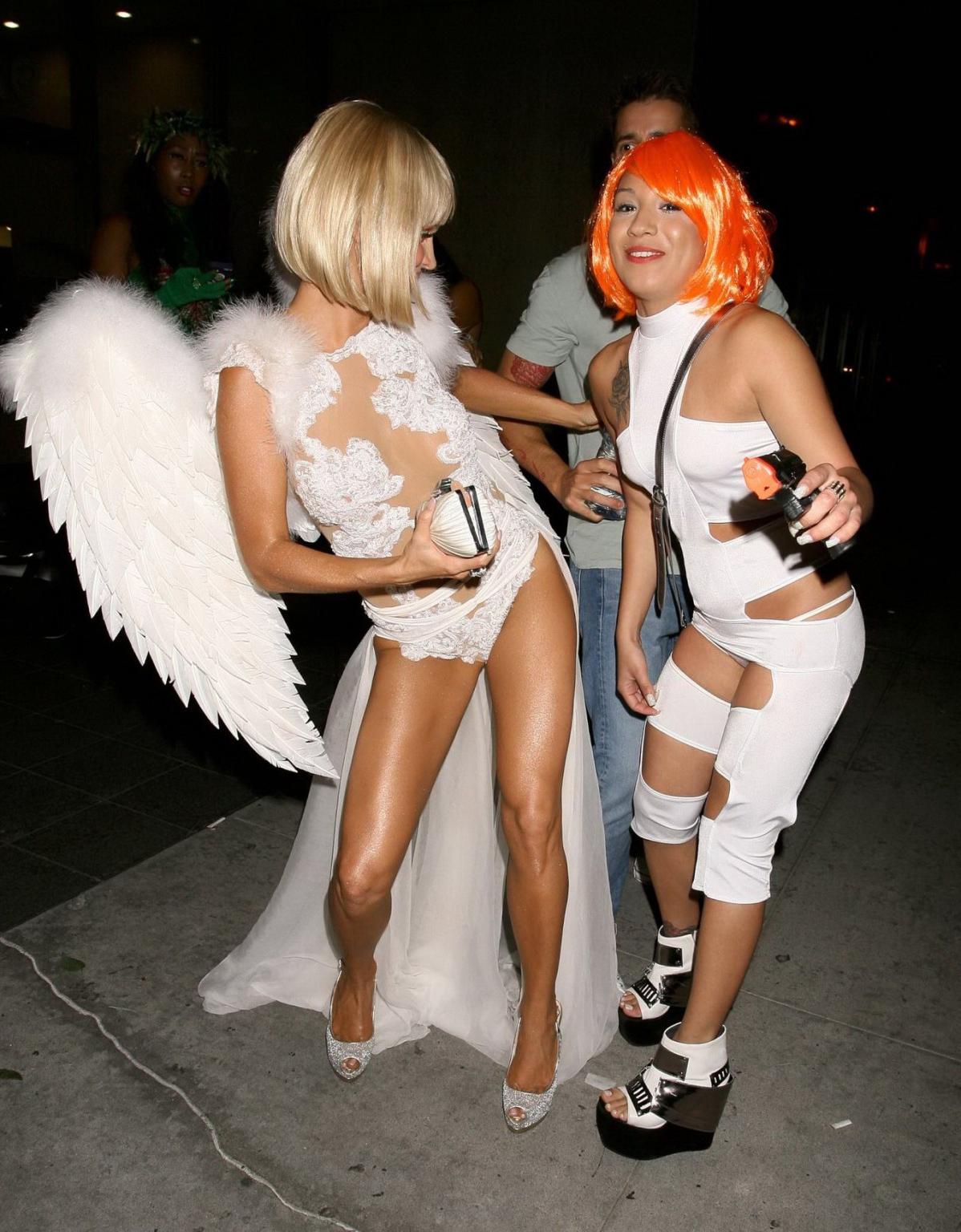 16P Joanna Krupa wearing nothing under see-through angel costume at Bootsy Bellows' 