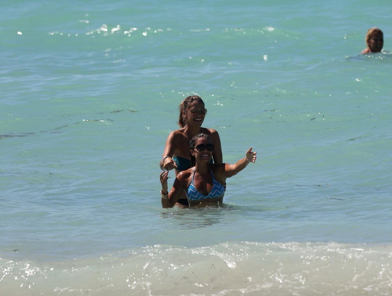 16P Sylvie van der Vaart wearing skimpy blue striped bikini on Miami Beach