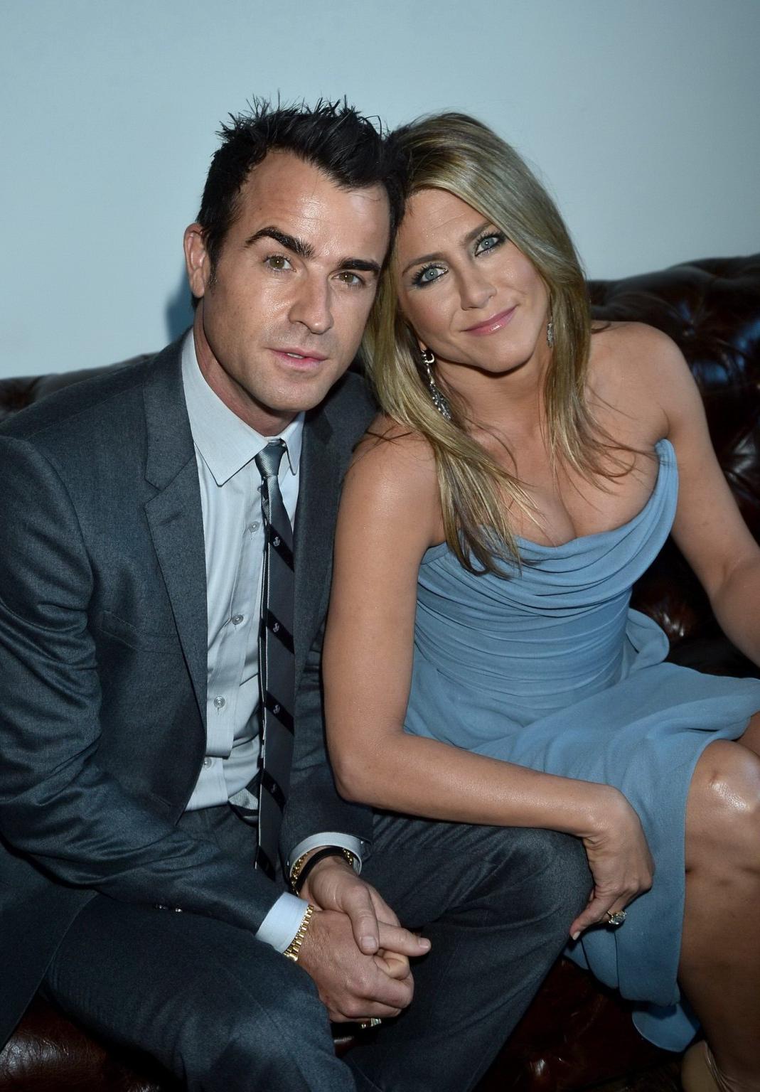 16P Jennifer Aniston wearing gorgeous blue strapless dress at the Life Of Crime prem