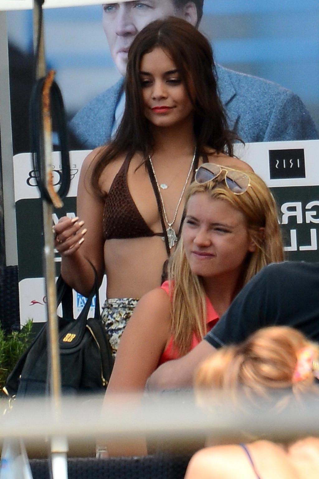16P Vanessa Hudgens wearing a sexy brown bikini on a boat in Ischia