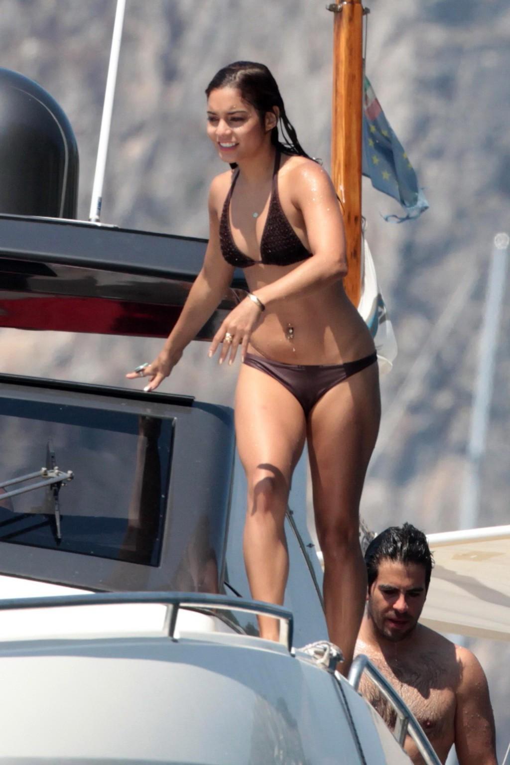 16P Vanessa Hudgens wearing a sexy brown bikini on a boat in Ischia