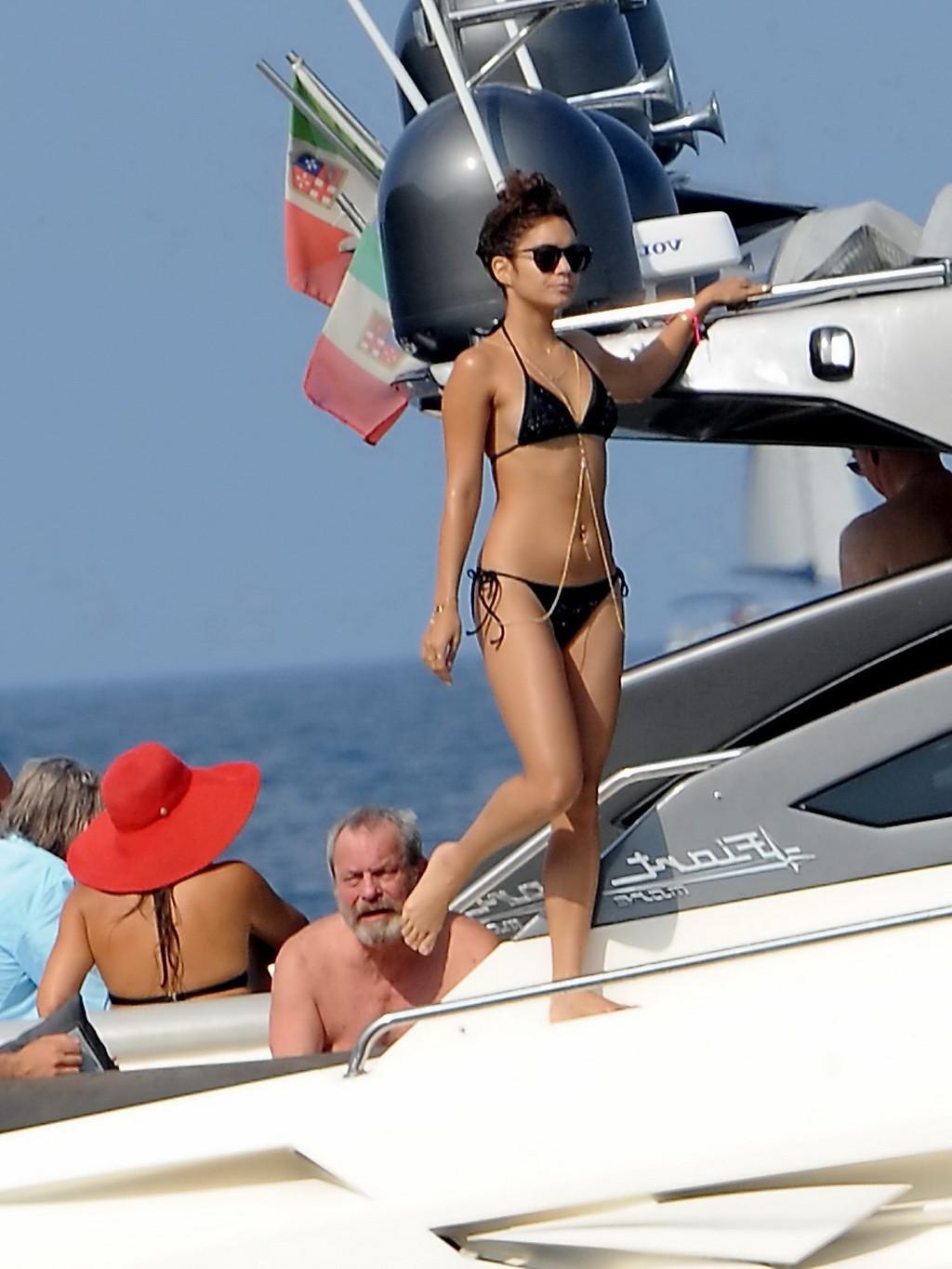 16P Vanessa Hudgens in black bikini doing yoga on a boat in Ischia, Italy