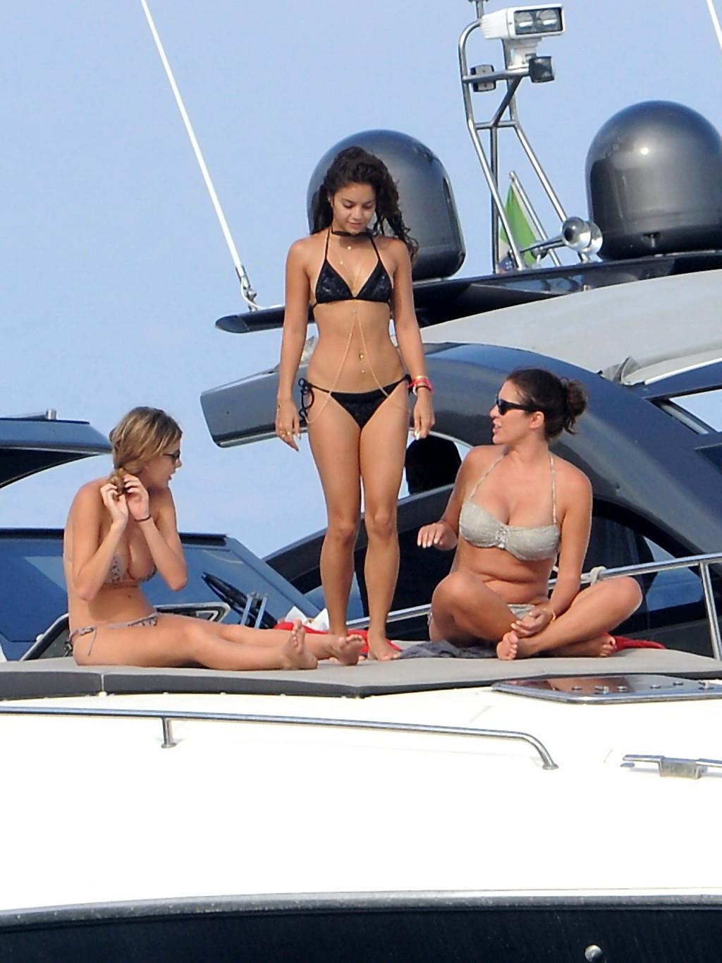 16P Vanessa Hudgens in black bikini doing yoga on a boat in Ischia, Italy