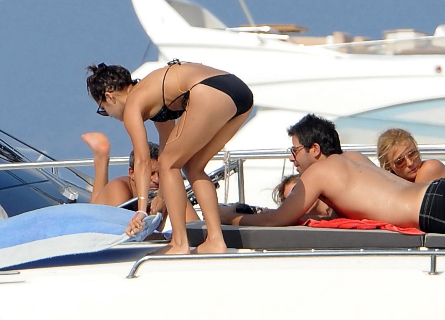 16P Vanessa Hudgens in black bikini doing yoga on a boat in Ischia, Italy