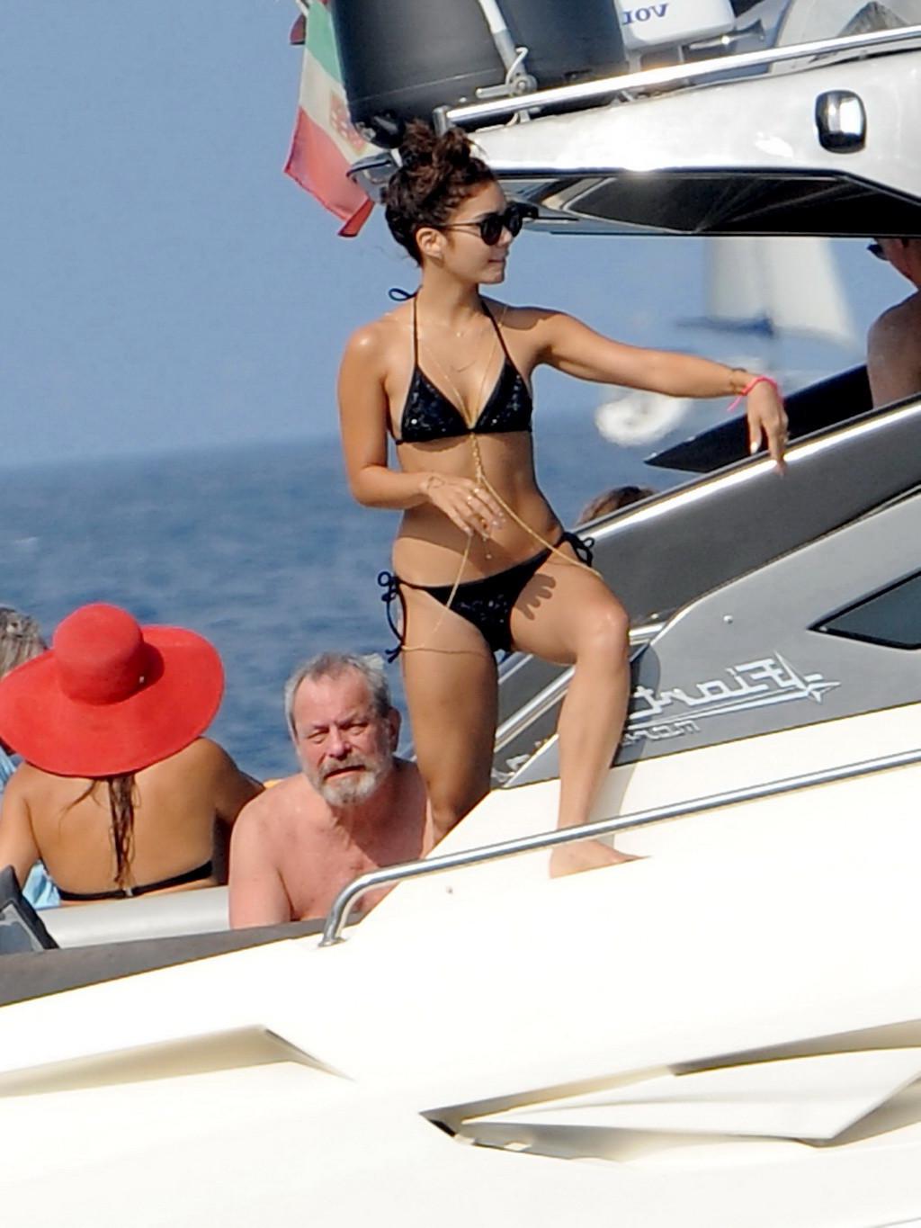 16P Vanessa Hudgens in black bikini doing yoga on a boat in Ischia, Italy
