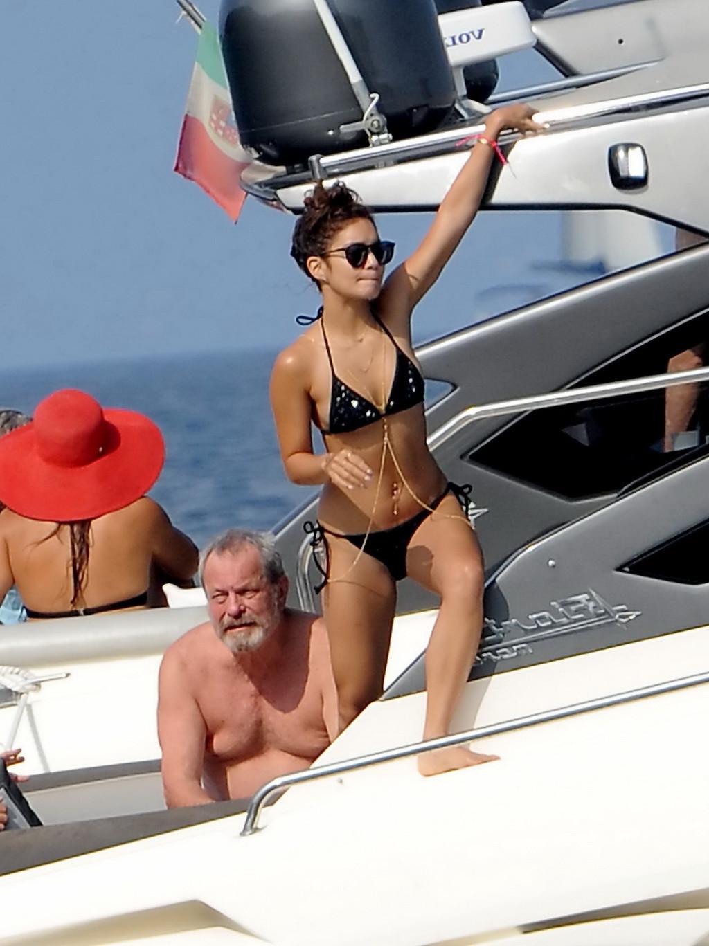 16P Vanessa Hudgens in black bikini doing yoga on a boat in Ischia, Italy