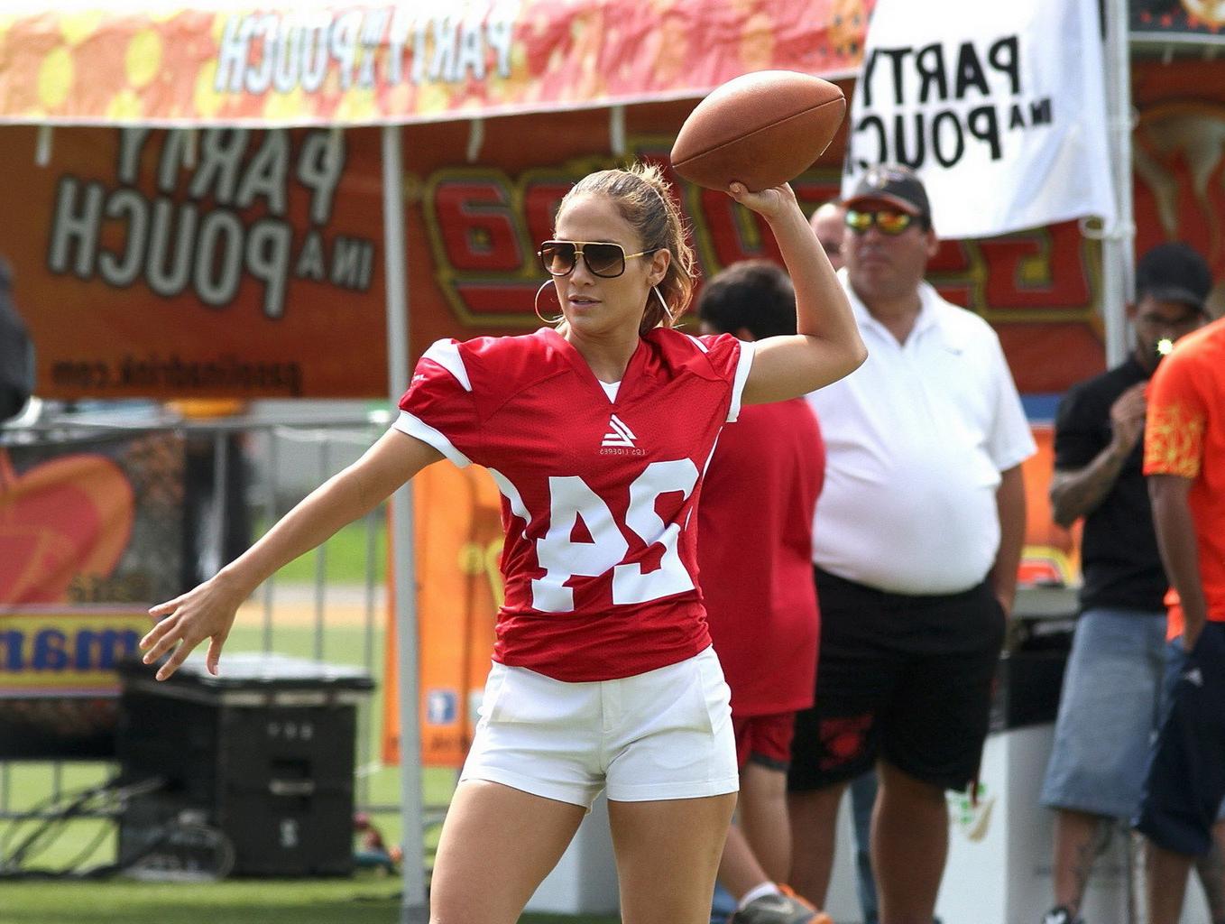 10P Jennifer Lopez stunning in a hot jersey at the charity football game in Puerto R