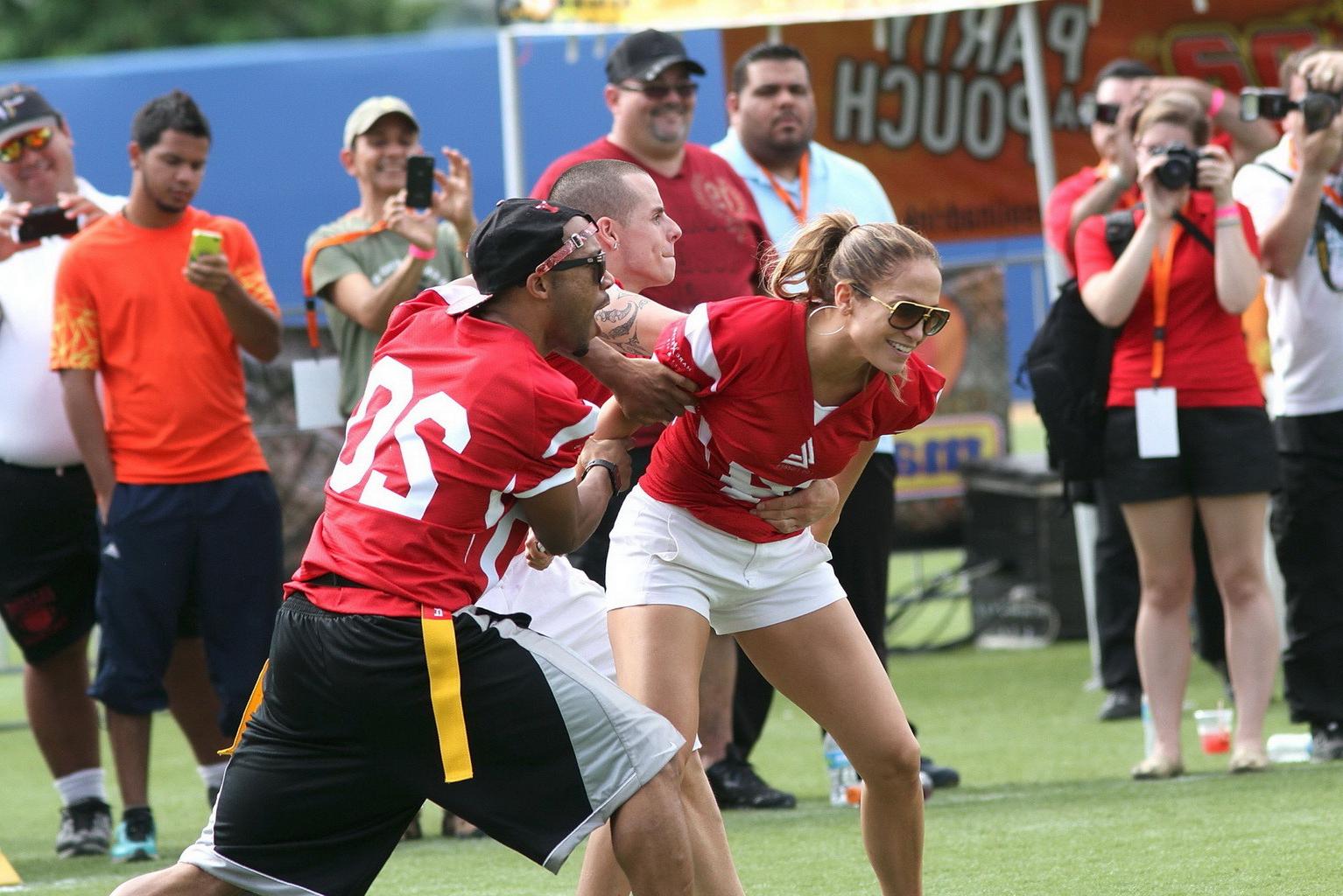 10P Jennifer Lopez stunning in a hot jersey at the charity football game in Puerto R