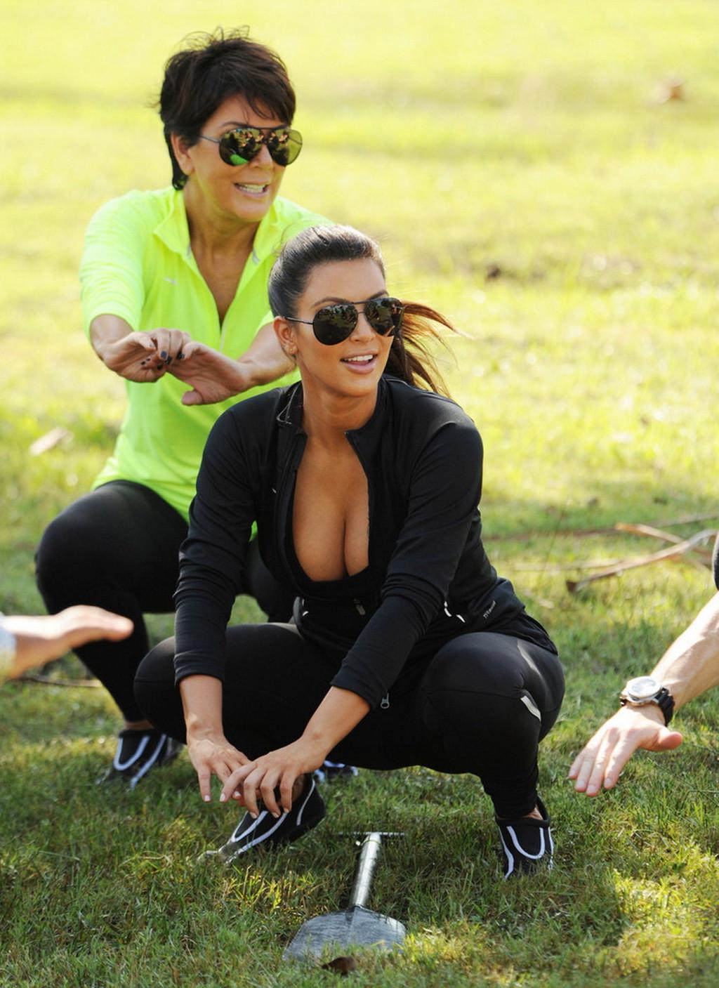 10P Kim Kardashian showing huge cleavage downblouse at the Miami Dragon Boat Festiva