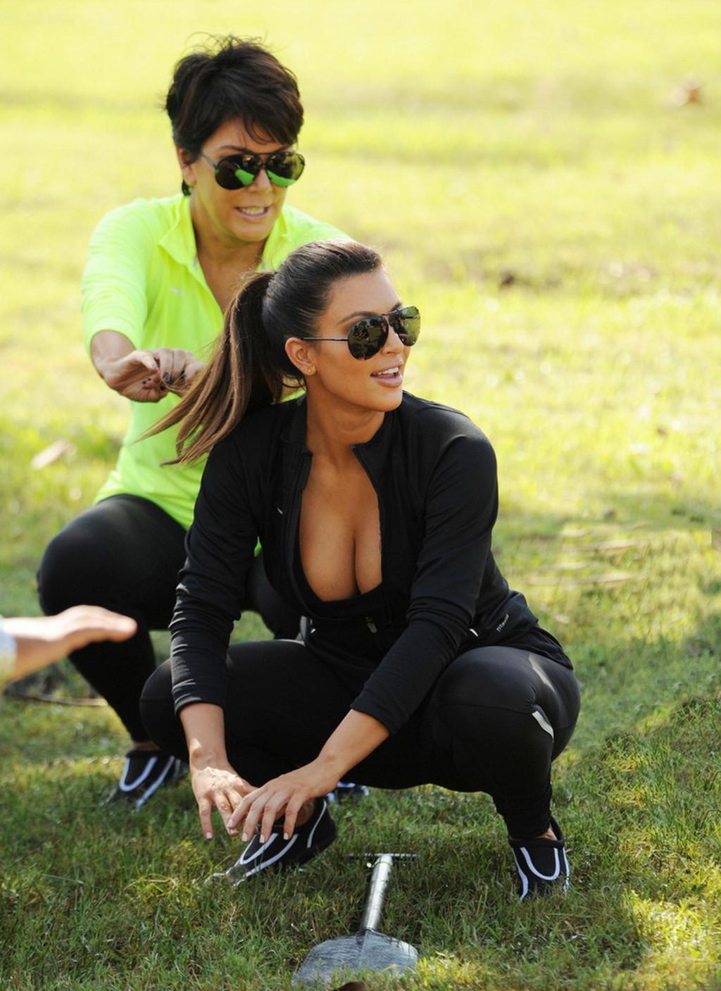 10P Kim Kardashian showing huge cleavage downblouse at the Miami Dragon Boat Festiva