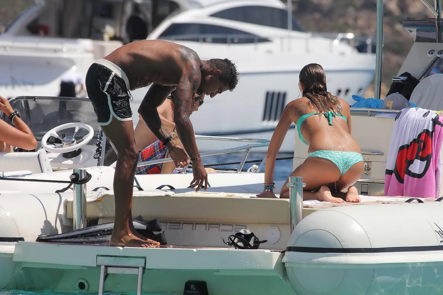 11P Gorgeous Melissa Satta wearing green thong bikini at the boat in Sardinia