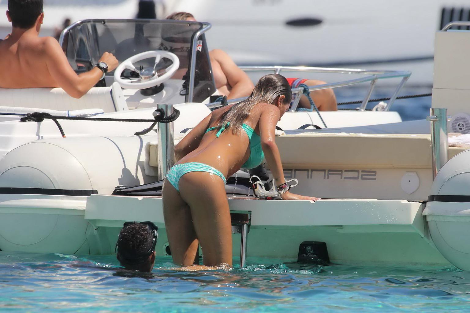 11P Gorgeous Melissa Satta wearing green thong bikini at the boat in Sardinia