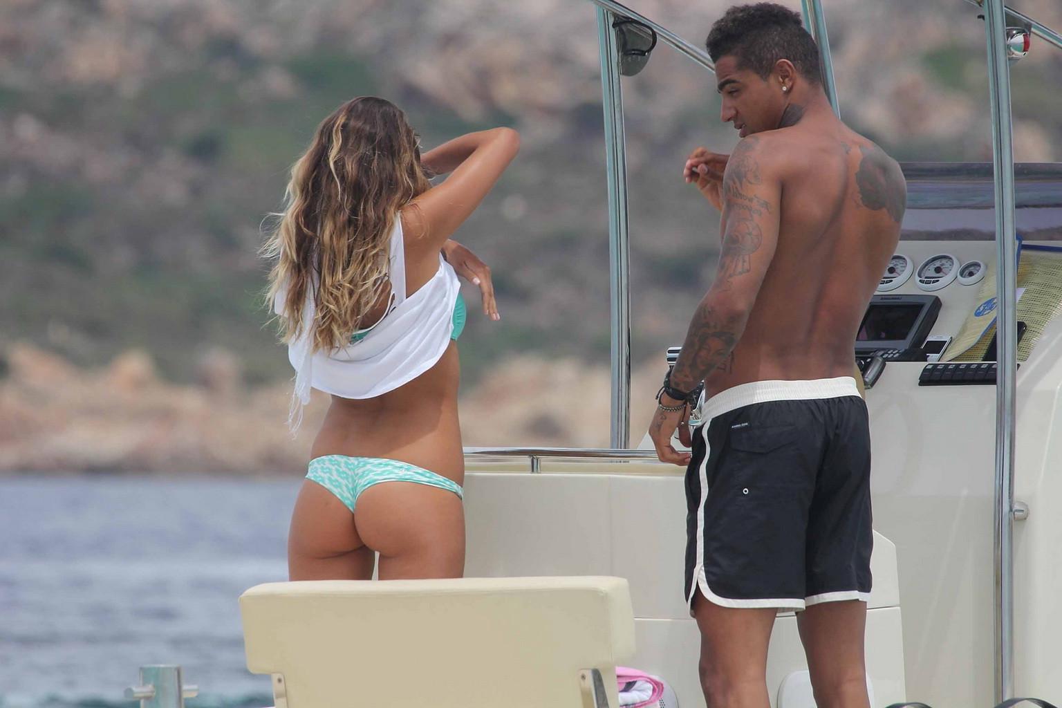 11P Gorgeous Melissa Satta wearing green thong bikini at the boat in Sardinia