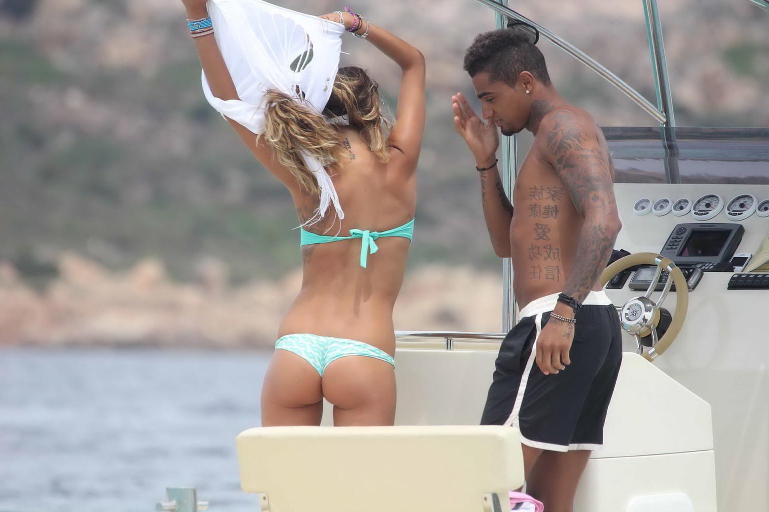 11P Gorgeous Melissa Satta wearing green thong bikini at the boat in Sardinia