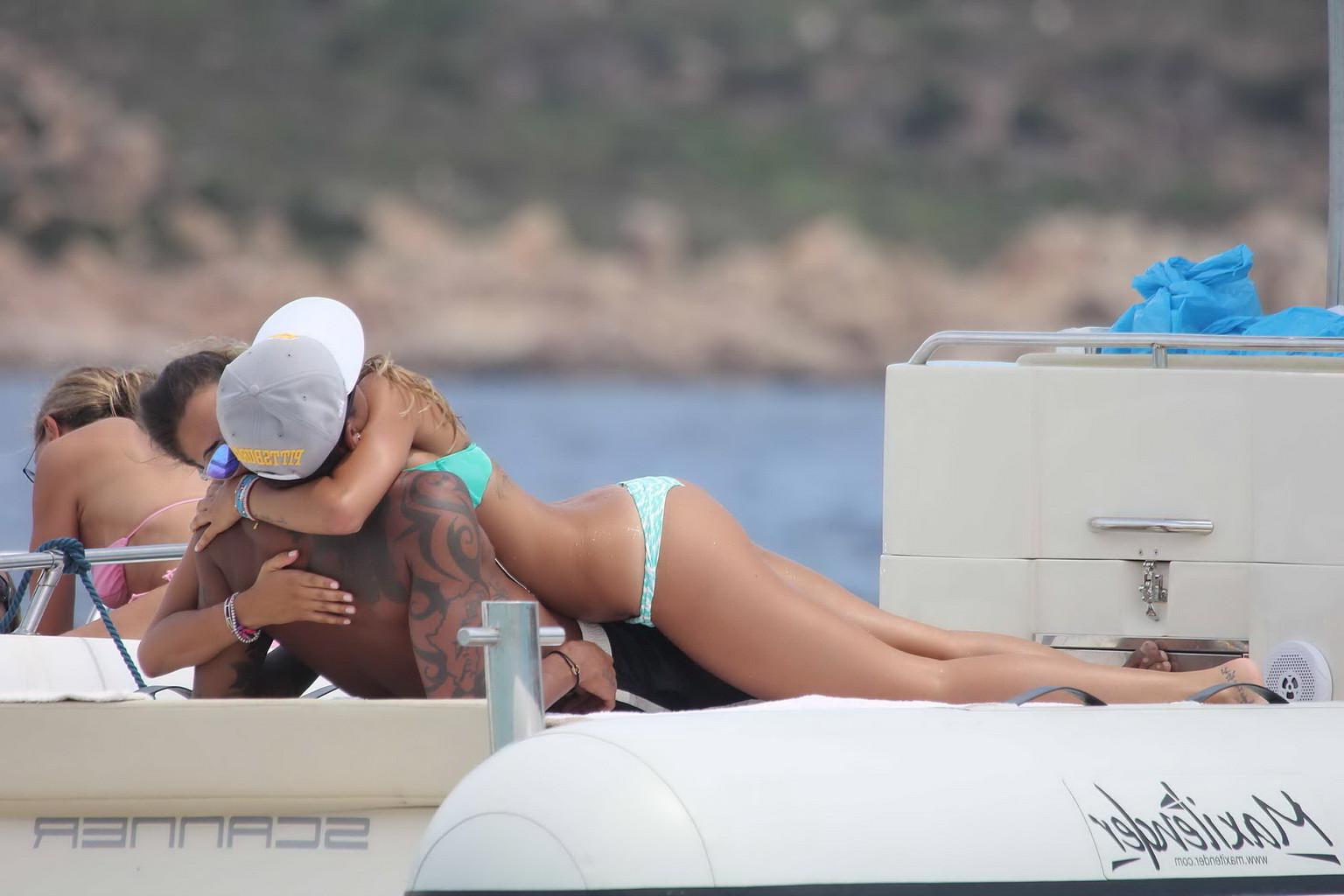 11P Gorgeous Melissa Satta wearing green thong bikini at the boat in Sardinia