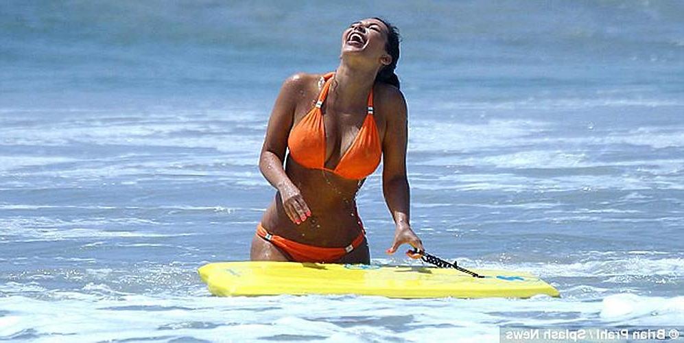 16P Kim Kardashian exposing sexy ass and huge boobs in blue bikini
