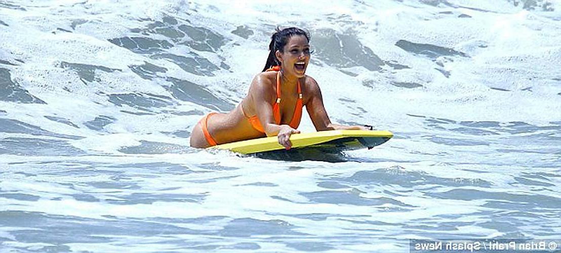 16P Kim Kardashian exposing sexy ass and huge boobs in blue bikini