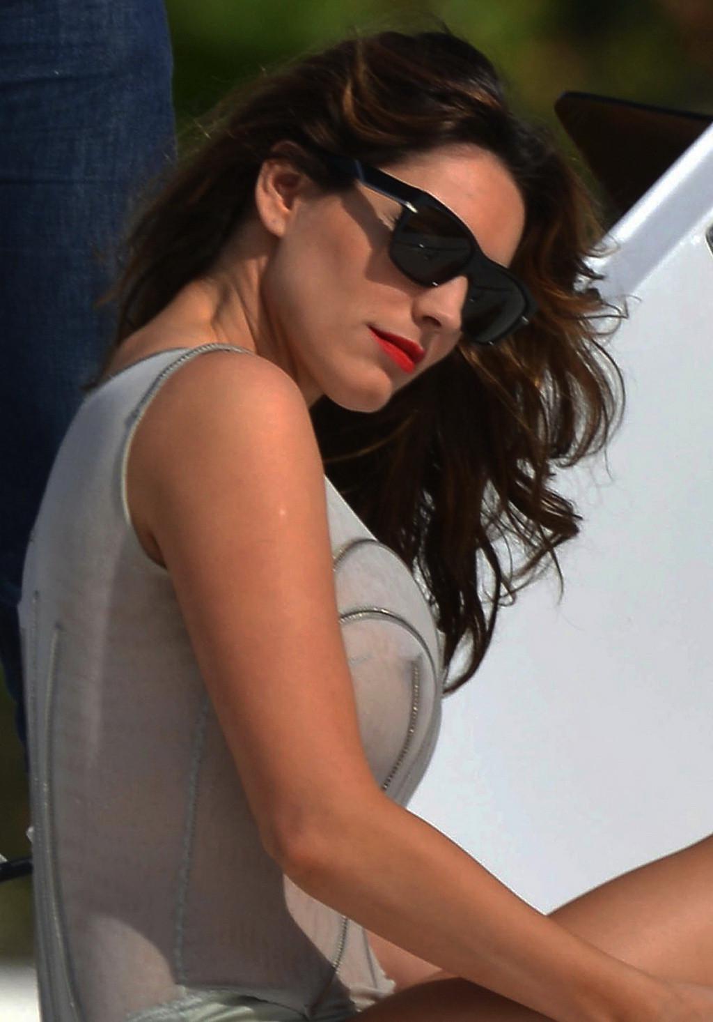 10P Busty Kelly Brook wearing see through swimsuit at the photoshoot in Cannes
