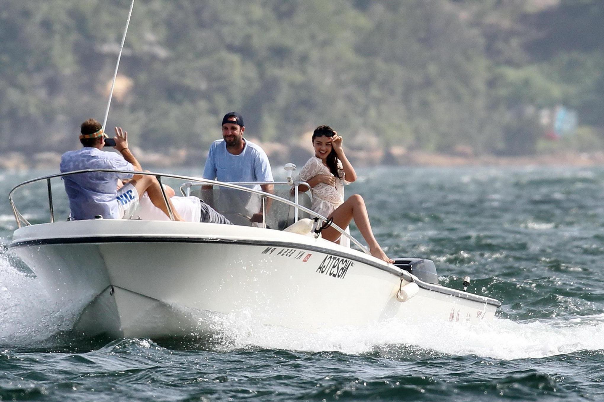 16P Miranda Kerr doing a bikini photoshoot on a boat in Sydney