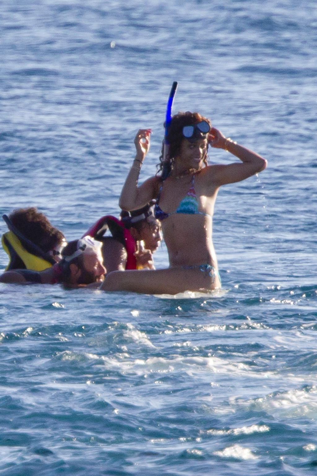 16P Rihanna in bikini showing ass  snorkeling near a Hawaiian beach