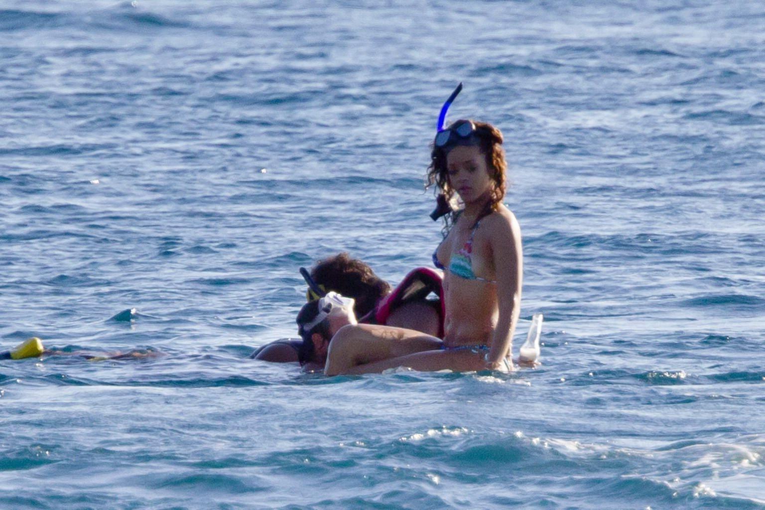 16P Rihanna in bikini showing ass  snorkeling near a Hawaiian beach