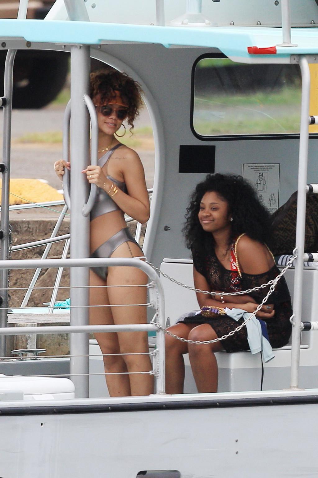 16P Rihanna wearing sexy swimsuit on a yacht in Hawaii