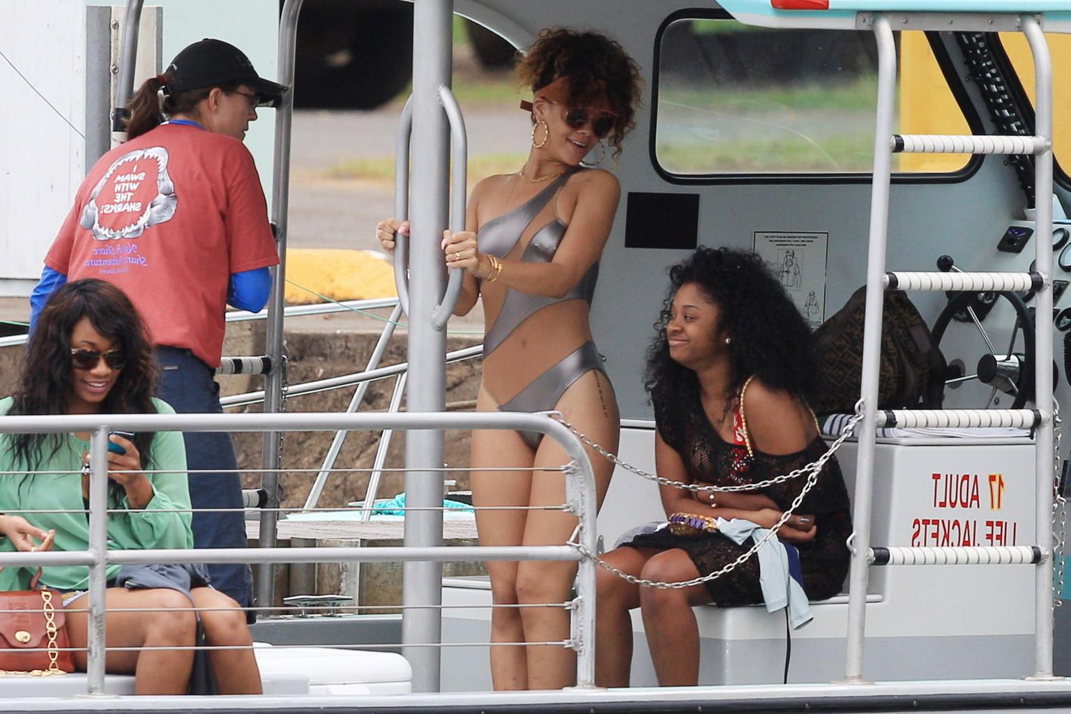 16P Rihanna wearing sexy swimsuit on a yacht in Hawaii