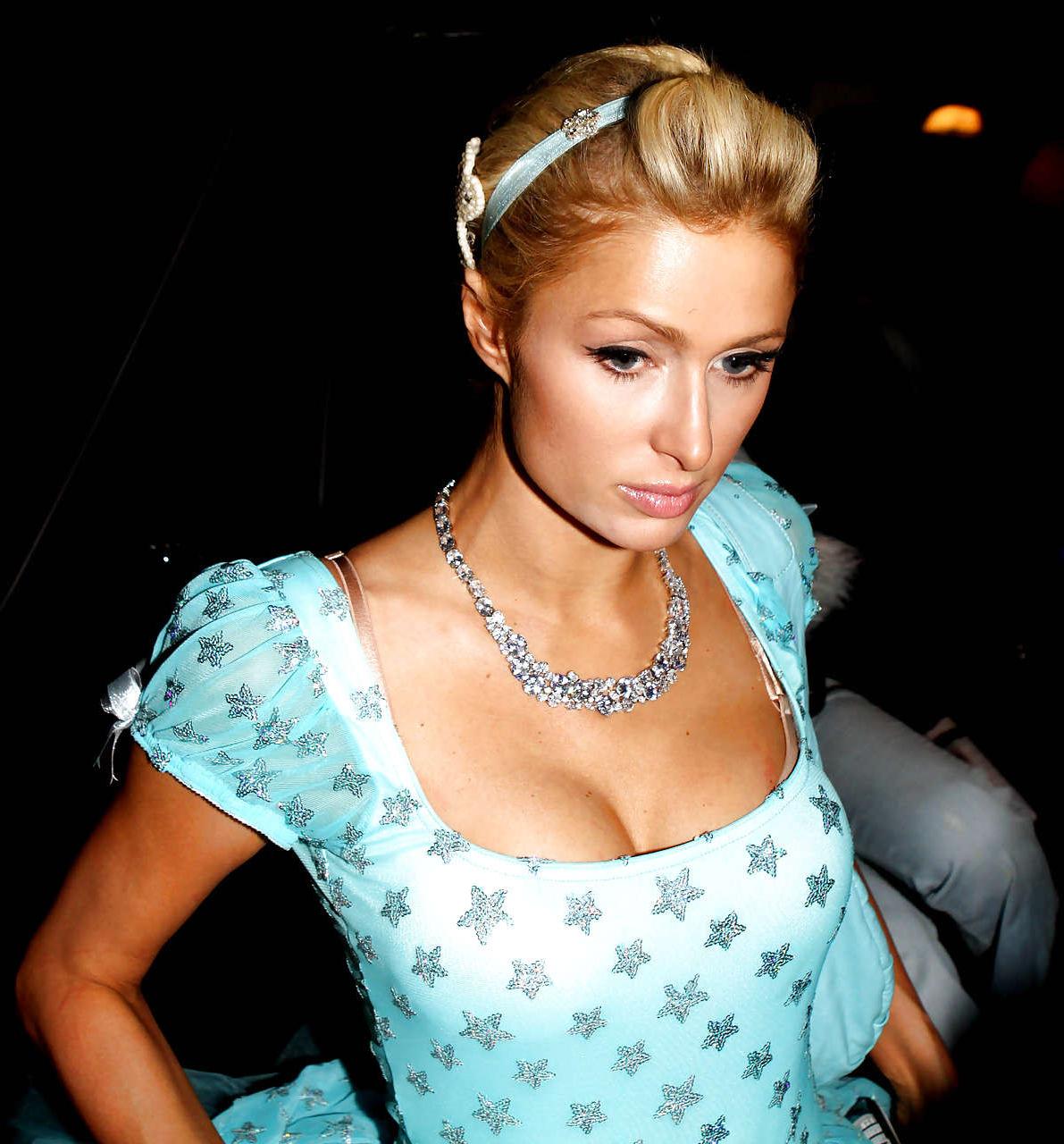 16P Paris Hilton showing little of her ass in short helloween costume