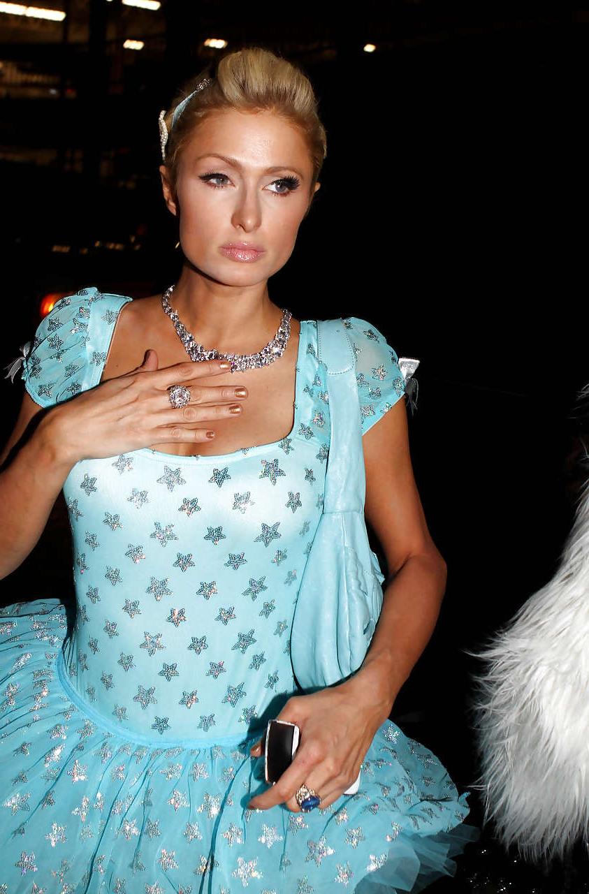 16P Paris Hilton showing little of her ass in short helloween costume