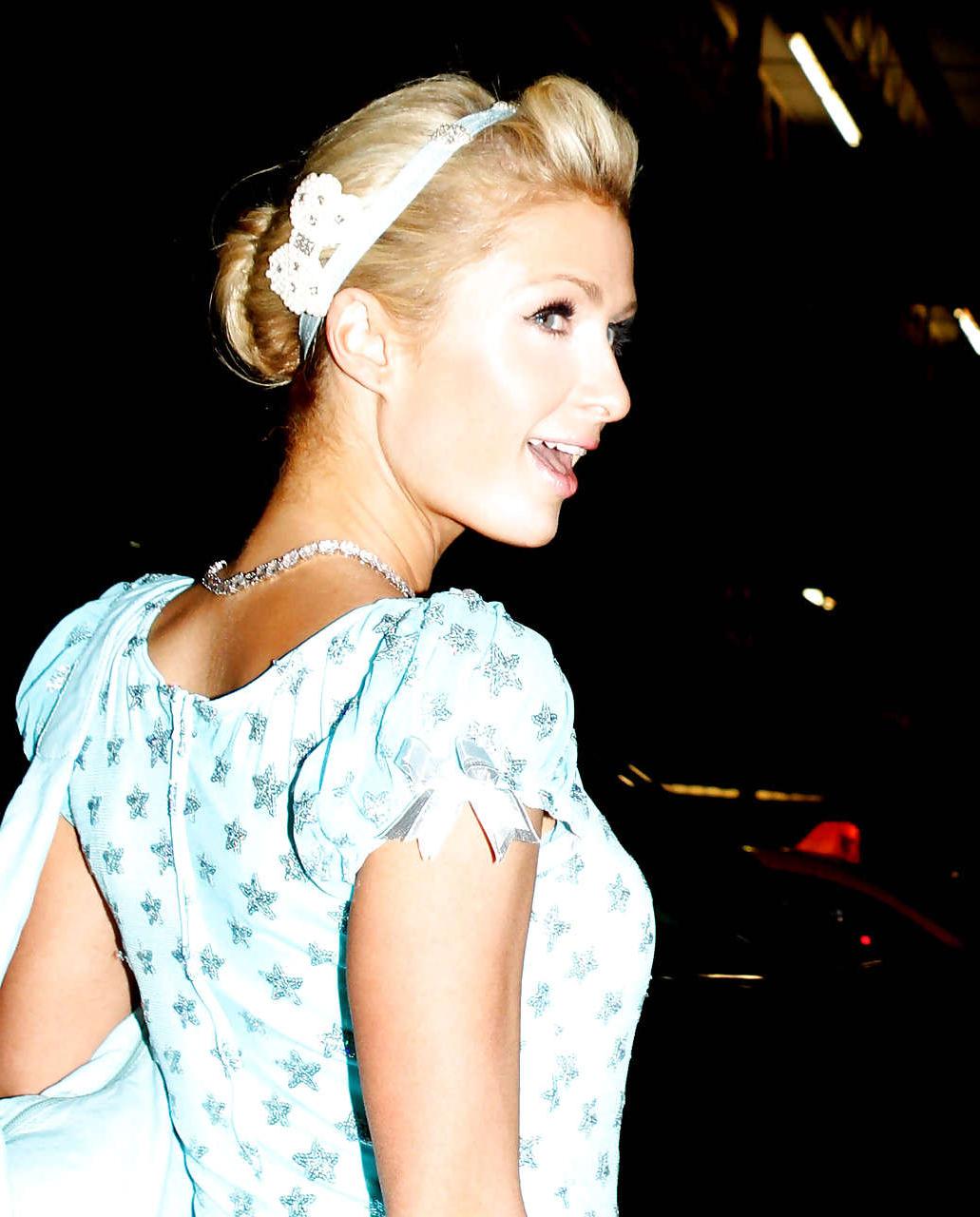 16P Paris Hilton showing little of her ass in short helloween costume