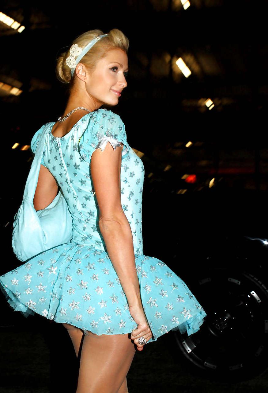 16P Paris Hilton showing little of her ass in short helloween costume