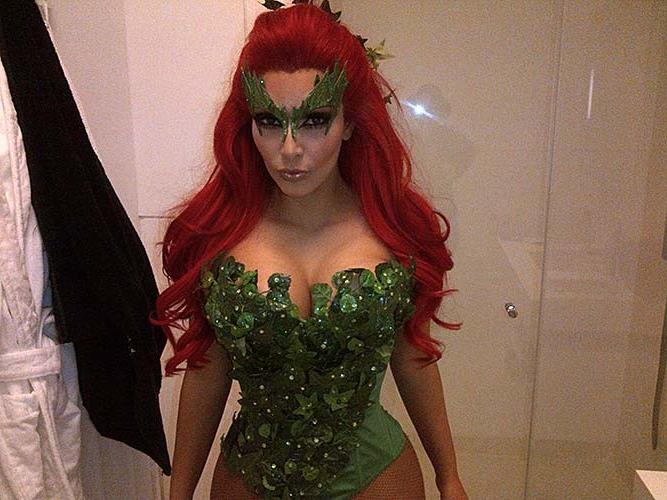 16P Kim Kardashian exposing sexy body and huge boobs in haeloween costume