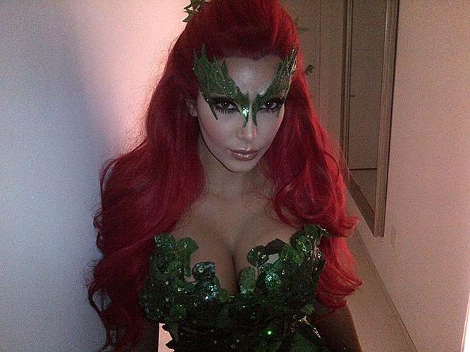 16P Kim Kardashian exposing sexy body and huge boobs in haeloween costume