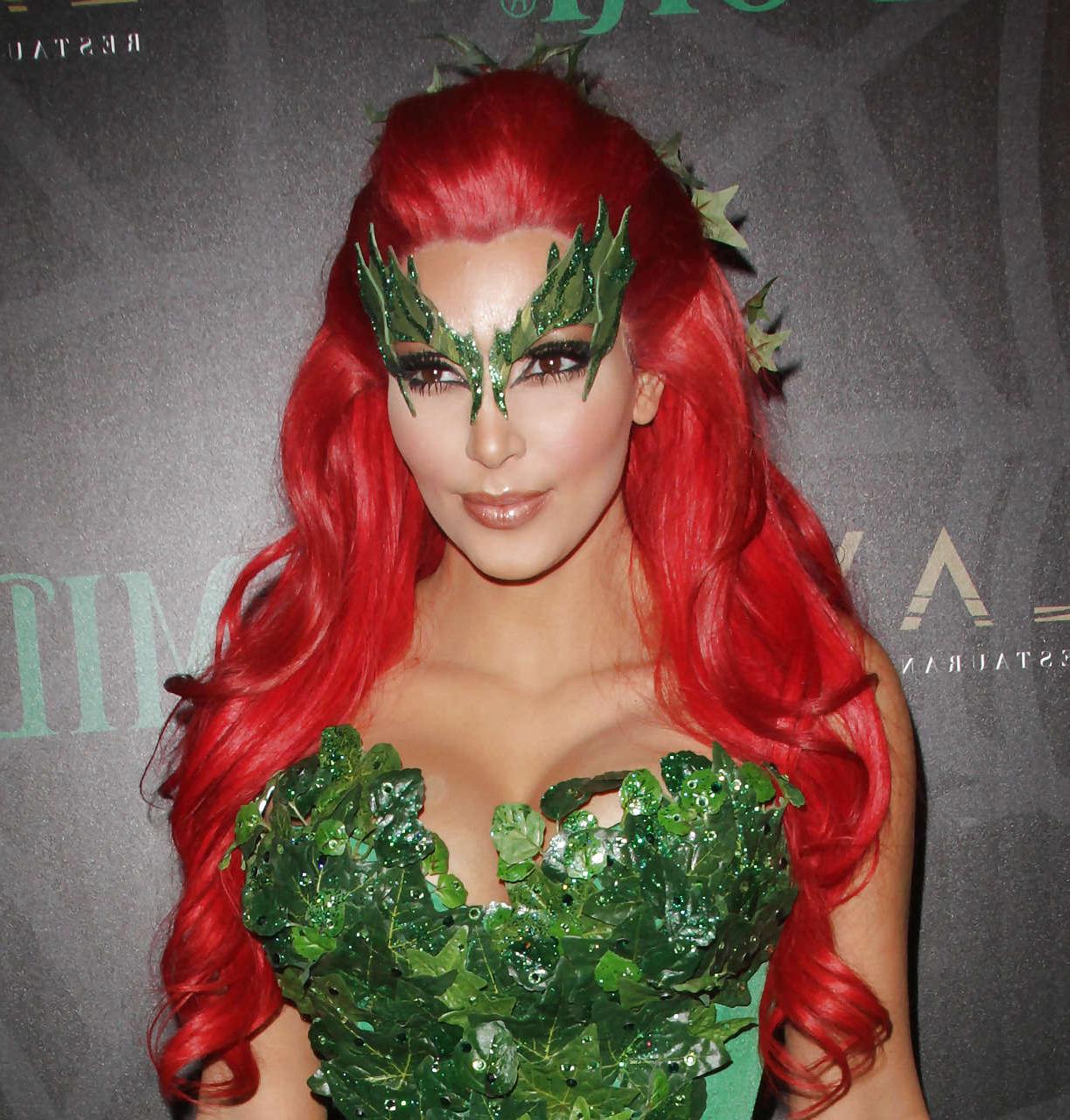 16P Kim Kardashian as redhair in Poison Ivy costume for Helloween party