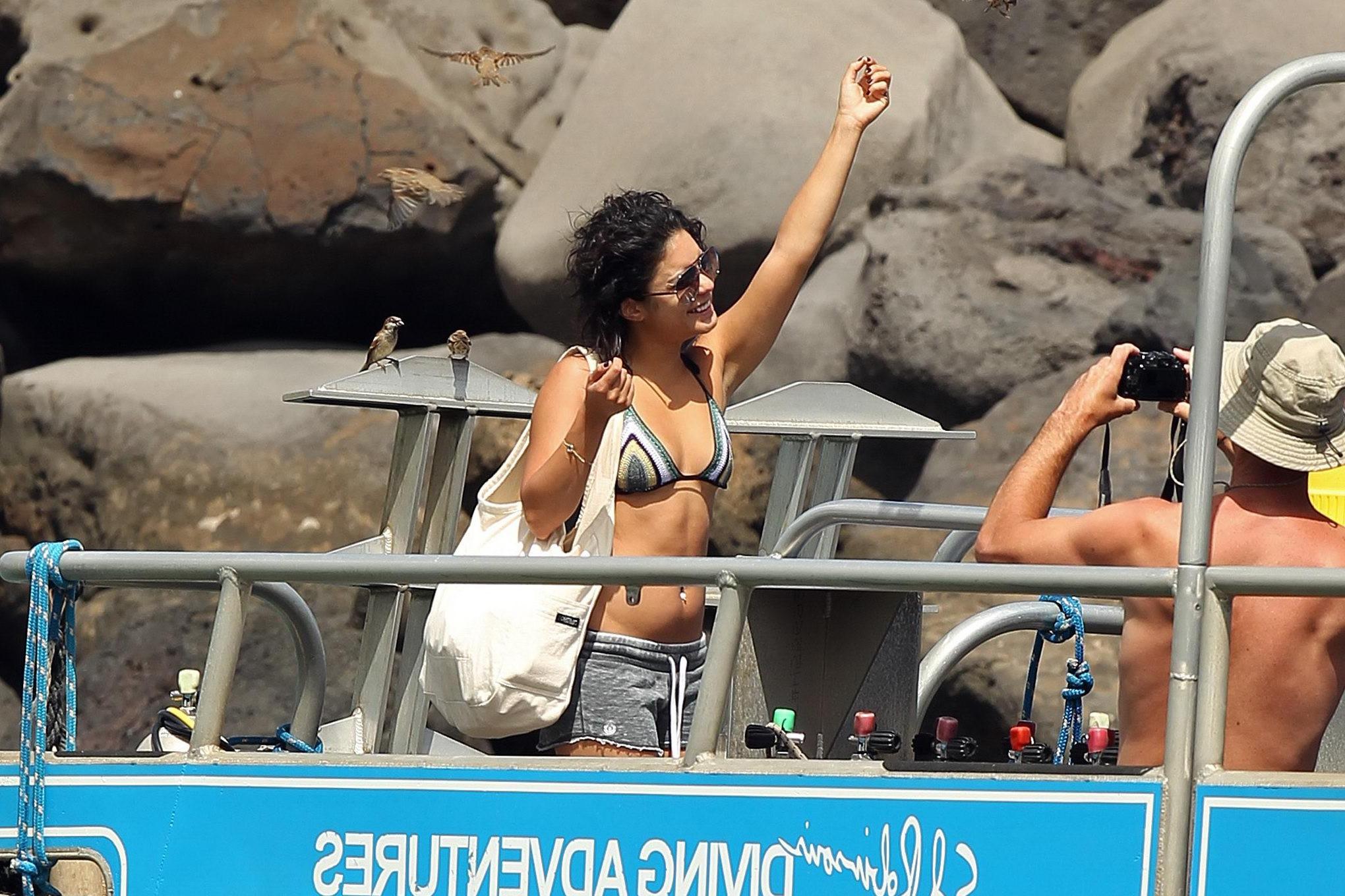 16P Vanessa Hudgens in bikini top  shorts leaving a boat in Maui