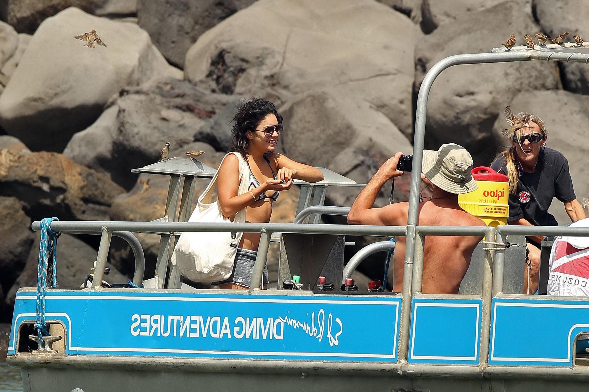 16P Vanessa Hudgens in bikini top  shorts leaving a boat in Maui