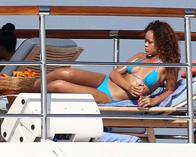 16P Rihanna exposing her sexy body and hot ass in blue bikini on yacht