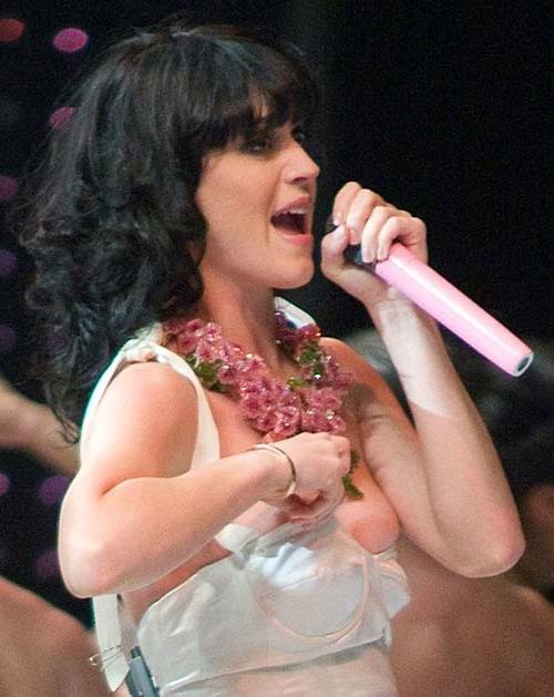 16P Katy Perry exposing sexy body and huge boobs in see thru blouse