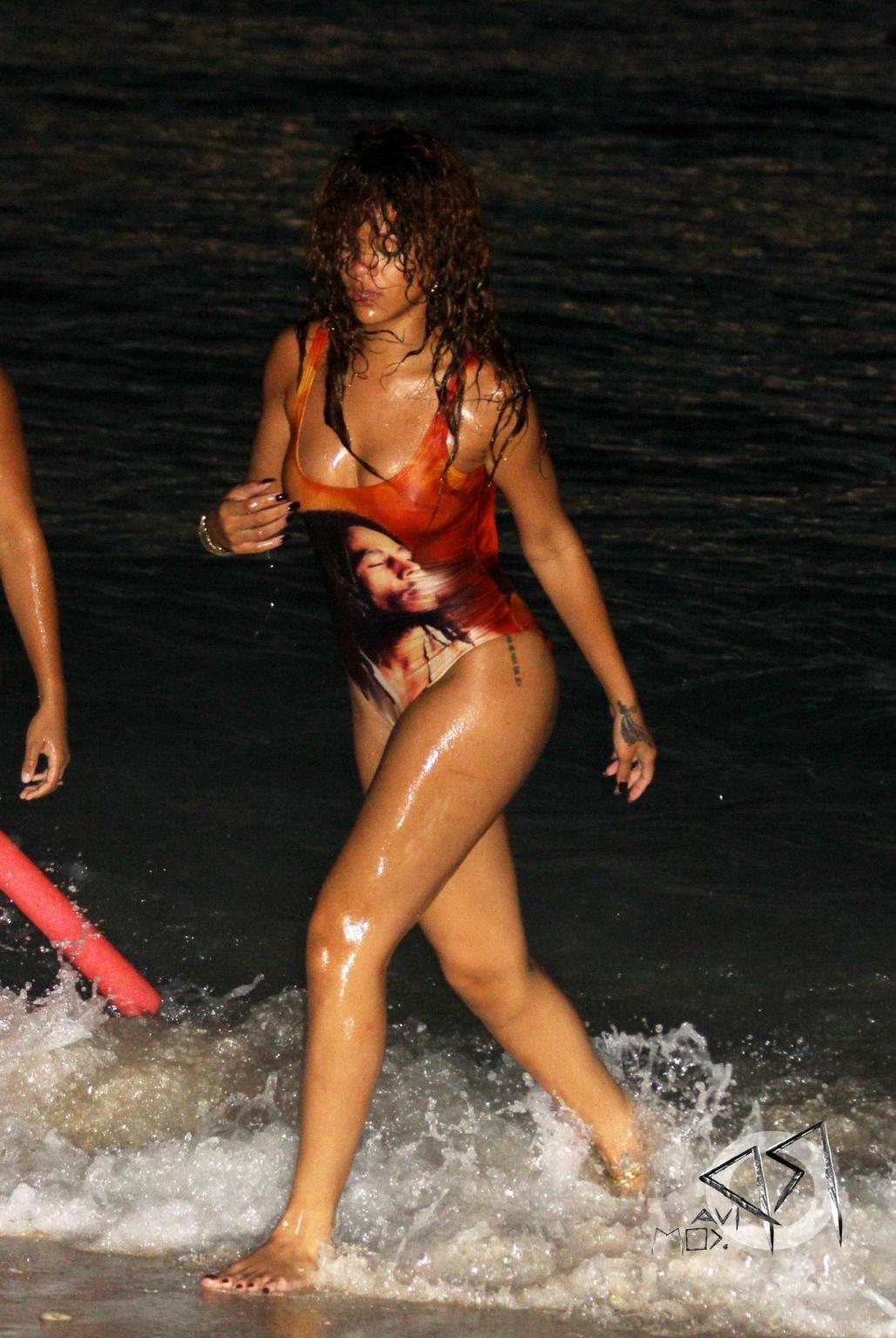 16P Rihanna in sexy swimsuit going for a dusk swim in Barbados